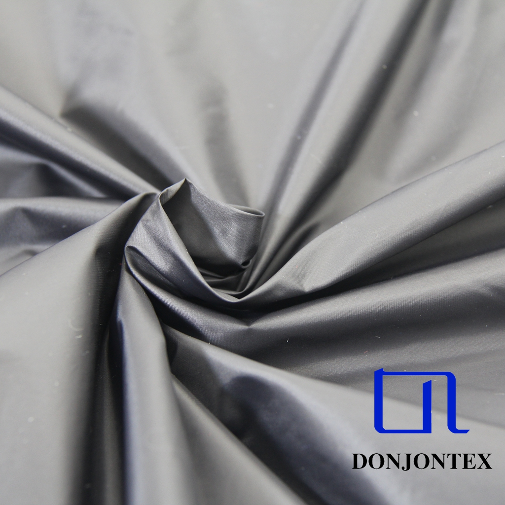 High Quality Anti-tear Down-proof Anti-wrinkle 380T Nylon Taffeta Cire Fabric For Down-proof Jacket