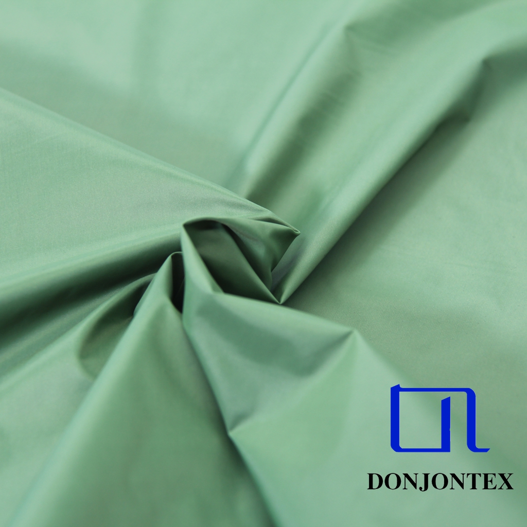 Hot sale Anti-tear Down-proof Anti-wrinkle 380T Nylon Taffeta Cire Fabric For Down-proof Jacket